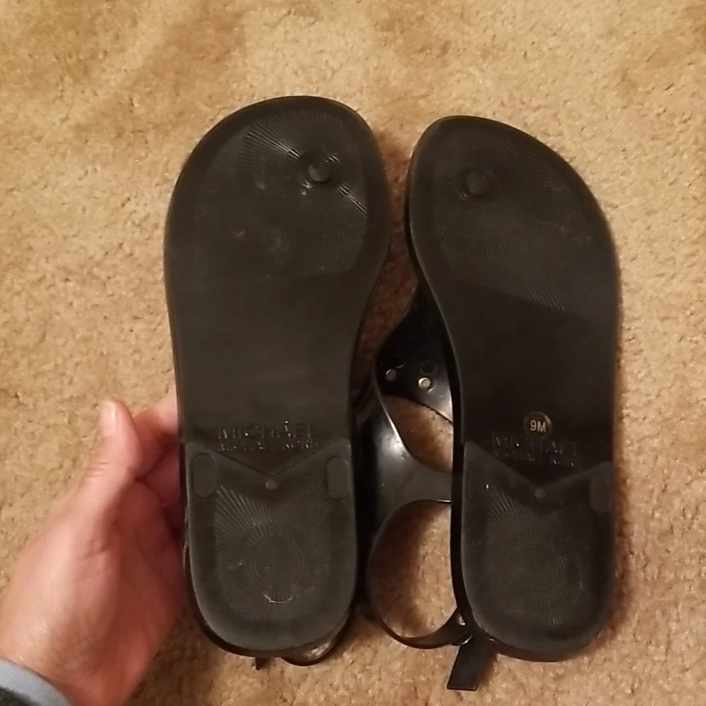 Michael Kors Black Jelly Thong Sandals with Gold Padlock Accent